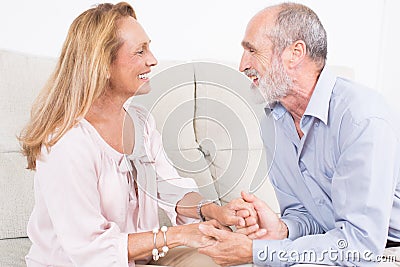 Happy elderly couple talking Stock Photo