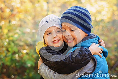 Happy embracing children Stock Photo
