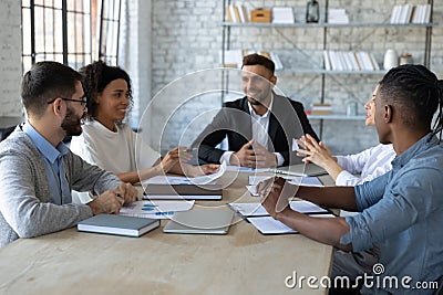 Positive young office workers having a meeting Stock Photo