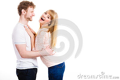 Happy enamoured couple hugging each other. Stock Photo