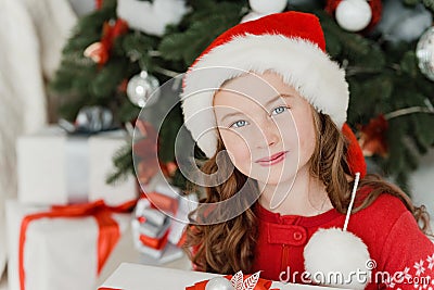 Happy excited girl child holding christmas gift box Stock Photo