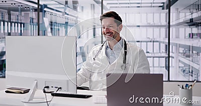 Happy Excited Male Doctor Raising Stock Photo