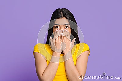 Happy Excitement. Cheerful Brunette Woman Sincerely Smiling And Covering Mouth With Hands, Received Pleasant Surprize Stock Photo