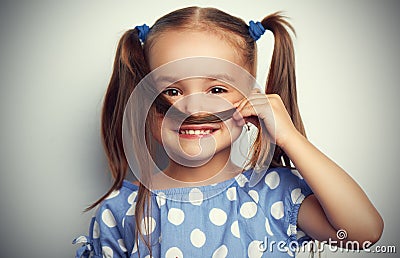 Happy face funny child girl in blue Stock Photo