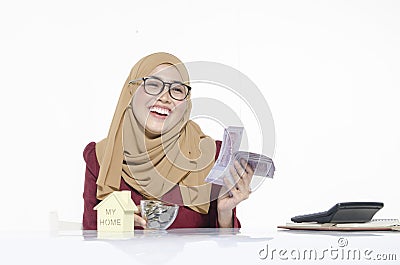 Happy face young lady with banknote for saving and investment co Stock Photo