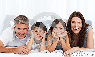 Happy familly looking at the camera Stock Photo