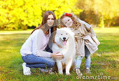 Happy family autumn, portrait pretty young mother and child walk Stock Photo