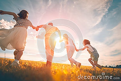 Happy family on autumn walk Stock Photo