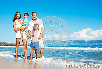 Happy Family on the Beach Stock Photo