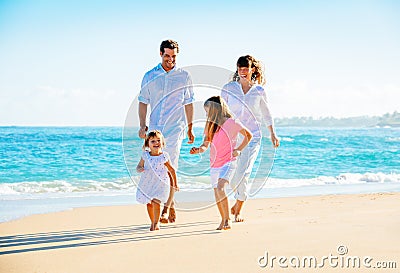 Happy Family on the Beach Stock Photo