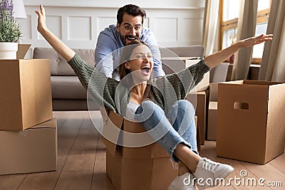 Happy family celebrating moving day, having fun at home Stock Photo