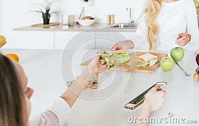 Happy family Mom cooking breakfast child home kitchen Stock Photo