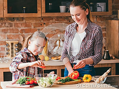 Happy family cooking healthy homemade food Stock Photo