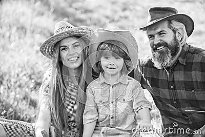 Happy family day. Mother father and cute son. Family farm. Parents and little baby. Spend time together. Lovely family Stock Photo