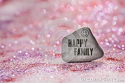 Happy family engrave on stone Stock Photo