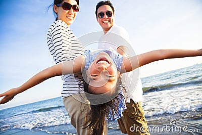 Happy family enjoy summer vacation on the beach Stock Photo