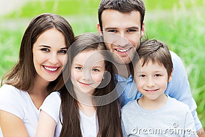 Happy family of four Stock Photo