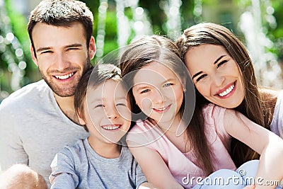 Happy family of four Stock Photo