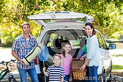 Happy family getting ready for road trip Stock Photo