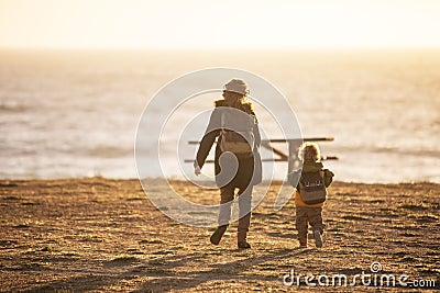 Happy family have a fun in pasific ocean Stock Photo