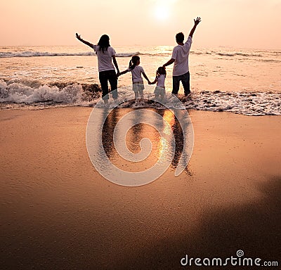 Happy family holding hands Stock Photo