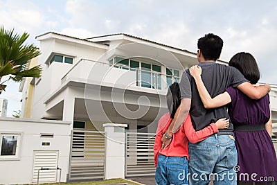 Happy family and house Editorial Stock Photo