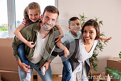 Happy family just moved in their new home Stock Photo