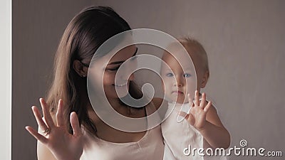 Happy family laughing faces, mother holding adorable child baby boy, smiling and hugging, close up border, beauty of Stock Photo