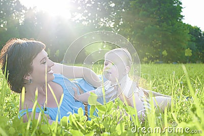 Happy Family Life Concepts and Ideas. Caucasian Brunette Mother with Her Toddler Son Spending Time Together Stock Photo