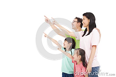 Happy family looking and pointing Stock Photo