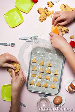 Happy family in making cookies at home. Happy children, cooking healthy food, top view Stock Photo