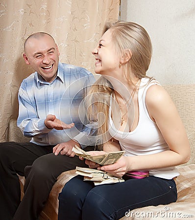 Happy family with mane US dollars Stock Photo