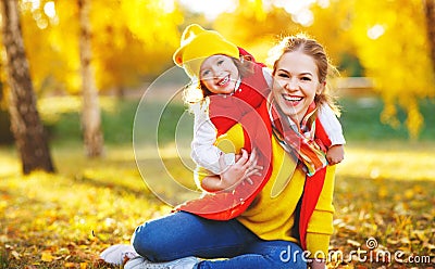 Happy family mother and child daughter on autumn walk Stock Photo