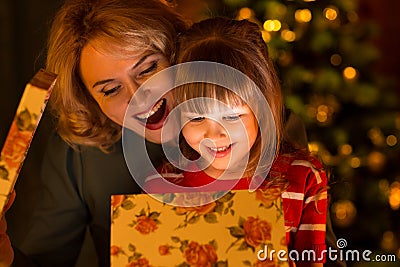 Happy family - mother and daughter child open Stock Photo