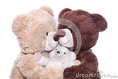 Happy family - mother, father and baby - concept with teddy bear Stock Photo