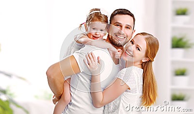 Happy family mother, father, child at home Stock Photo