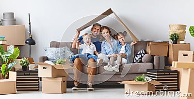 Happy family mother father and children move to new apartment an Stock Photo