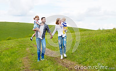 Happy family: mother, father, children son and daughter on summer Stock Photo