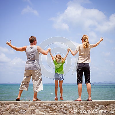 Happy family near the beach Stock Photo