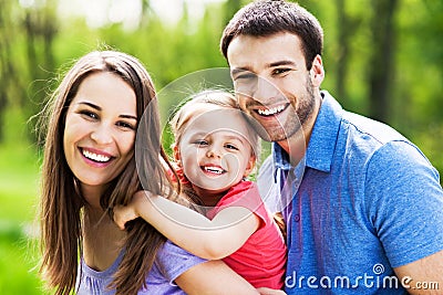 Happy family outdoors Stock Photo