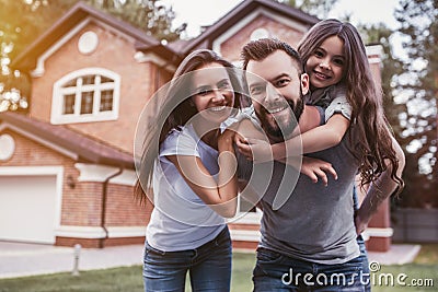 Happy family outdoors Stock Photo