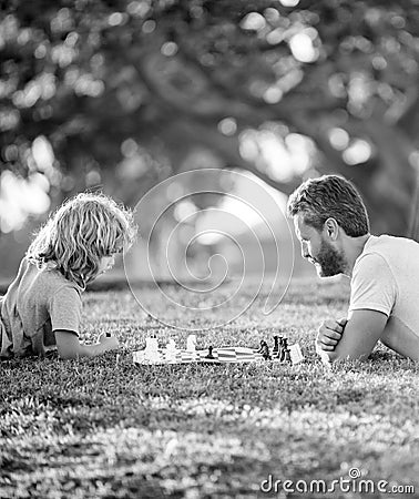 happy family. parenthood and childhood. checkmate. spending time together. Stock Photo