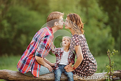 Happy family in a park Stock Photo