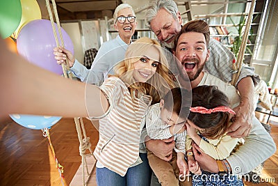 Happy family portrait with grandparents; Happy family offspring concept Stock Photo