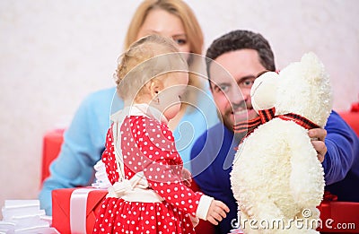 Happy family with present box. Love and trust in family. Bearded man and woman with little girl. father, mother and Stock Photo