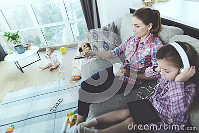 Happy Family Resting in Modern Living Room Stock Photo