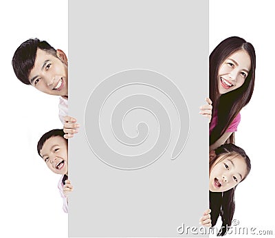 Happy family showing the Blank Board and banner On White Background Stock Photo