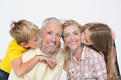 Happy family smiling and showing affection Stock Photo