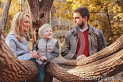 Happy family spending time together outdoor. Lifestyle capture, rural cozy scene Stock Photo