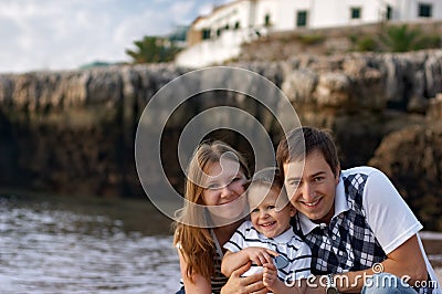 Happy family of three Stock Photo